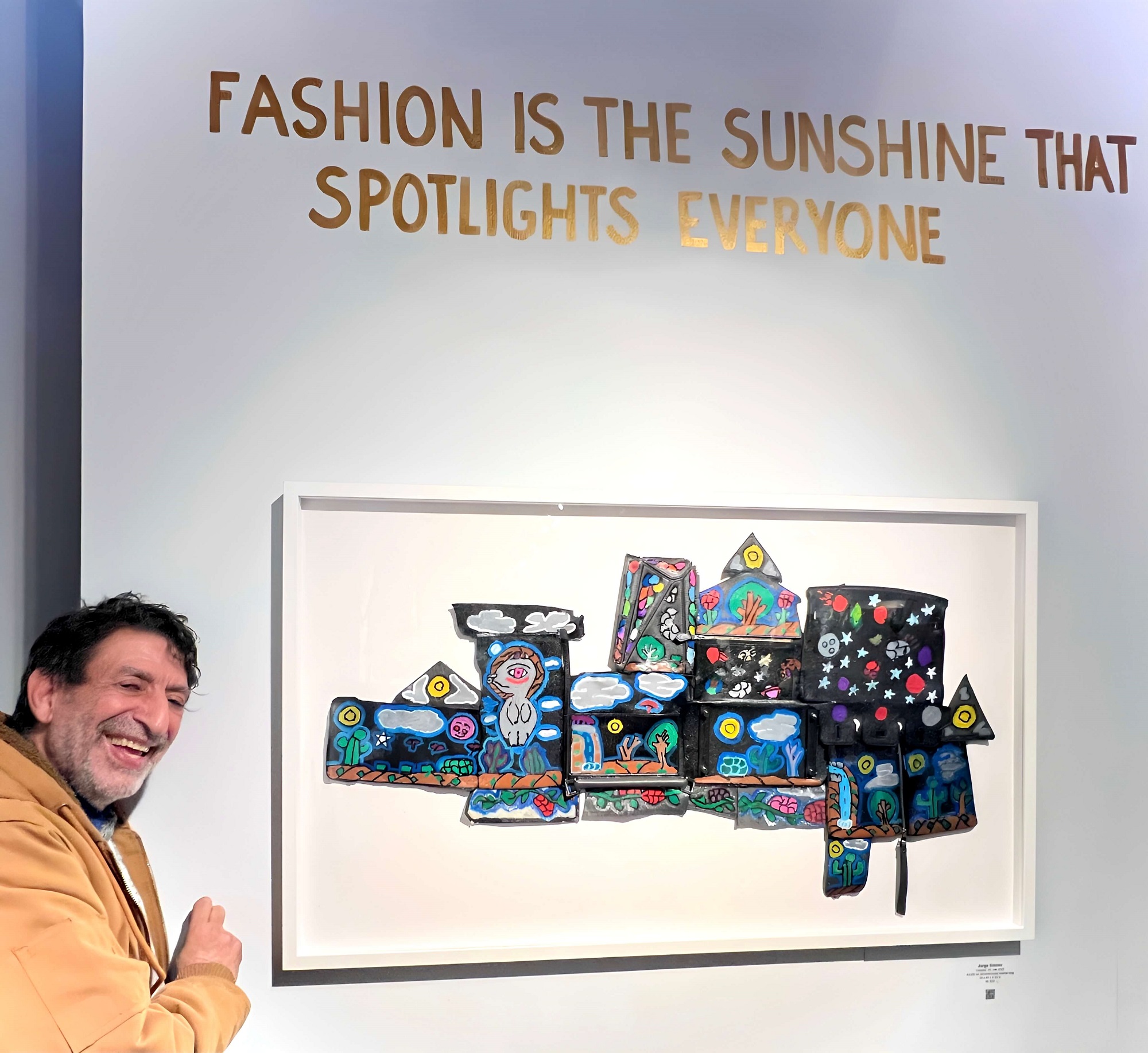 Artist Jorge Gomez with his Deconstructed Leather Bag. Fashion is the Sunshine That Spotlights Everyone. Creative Growth, Oak.