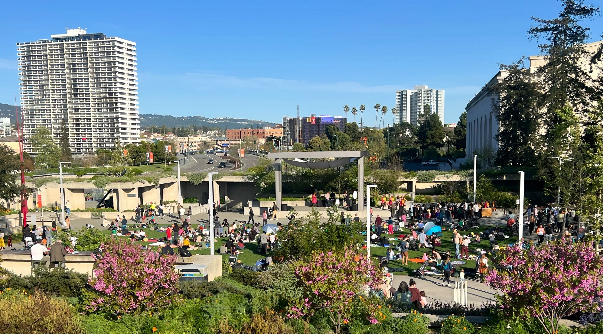 Friday Nights event goers enjoy an idyllic April evening in the OMCA Garden. Fairyland at 75. OMCA, Oak.