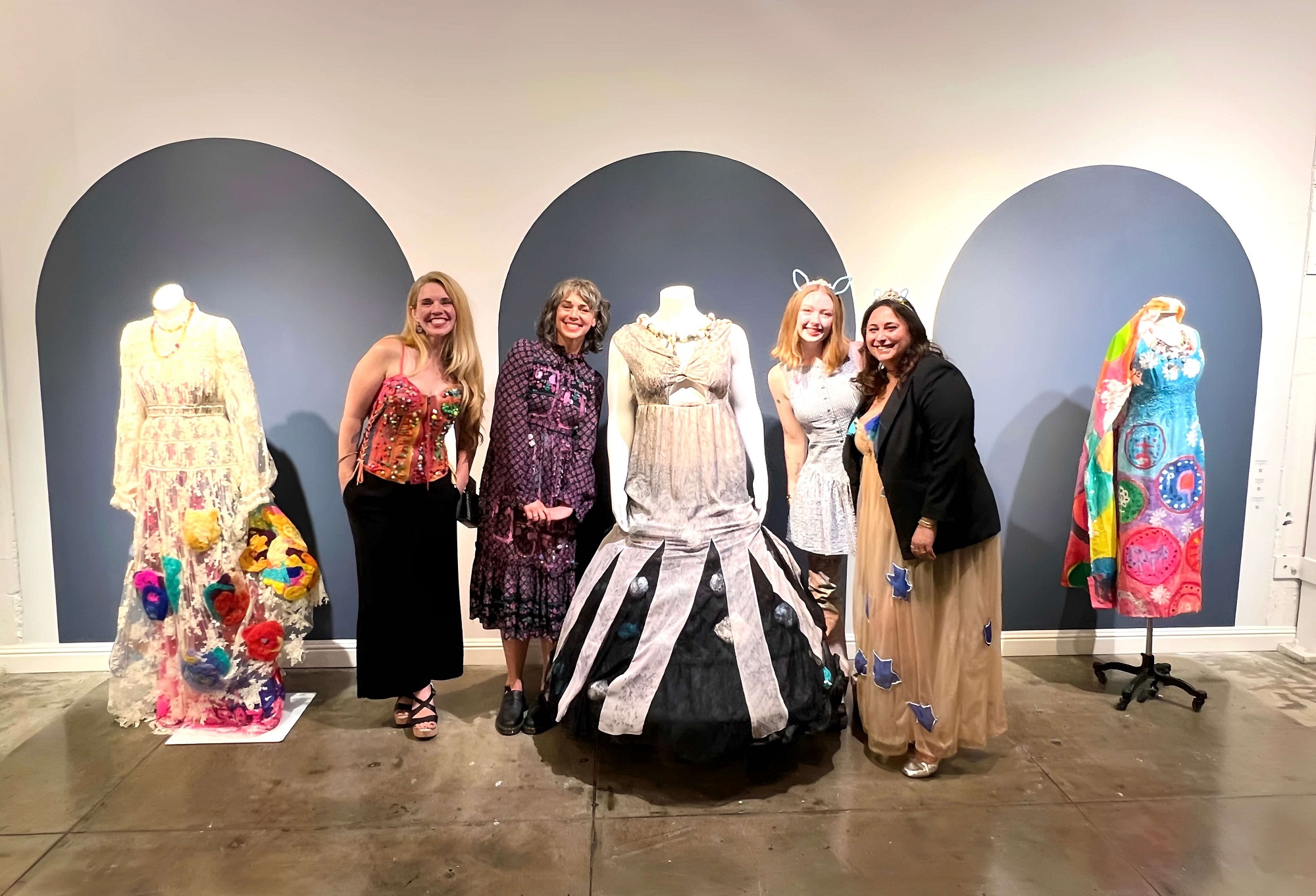CG's Quinn Dukes, Amy Keefer, Anna Fairbend, and Nadia Philomena Ghani with Dresses by Juan Aguilera, Dinah Shapiro, and Natascha Haehlen. Fashion is the Sunshine That Spotlights Everyone. Creative Growth, Oak.