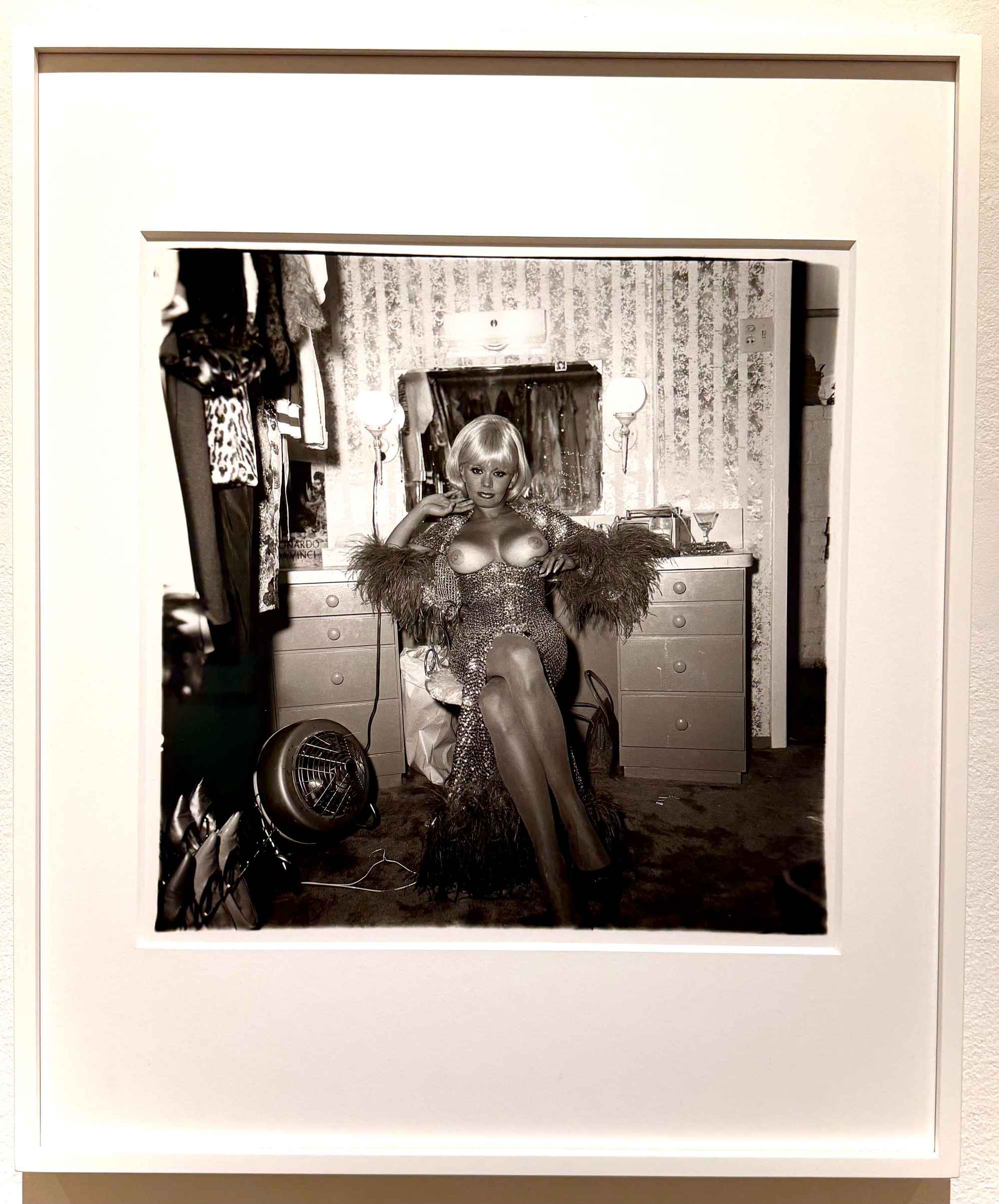 Diane Arbus. Topless dancer in her dressing room, San Francisco, Cal. 1968. Diane Arbus: Sanctum Sanctorum. Fraenkel Gallery, SF.