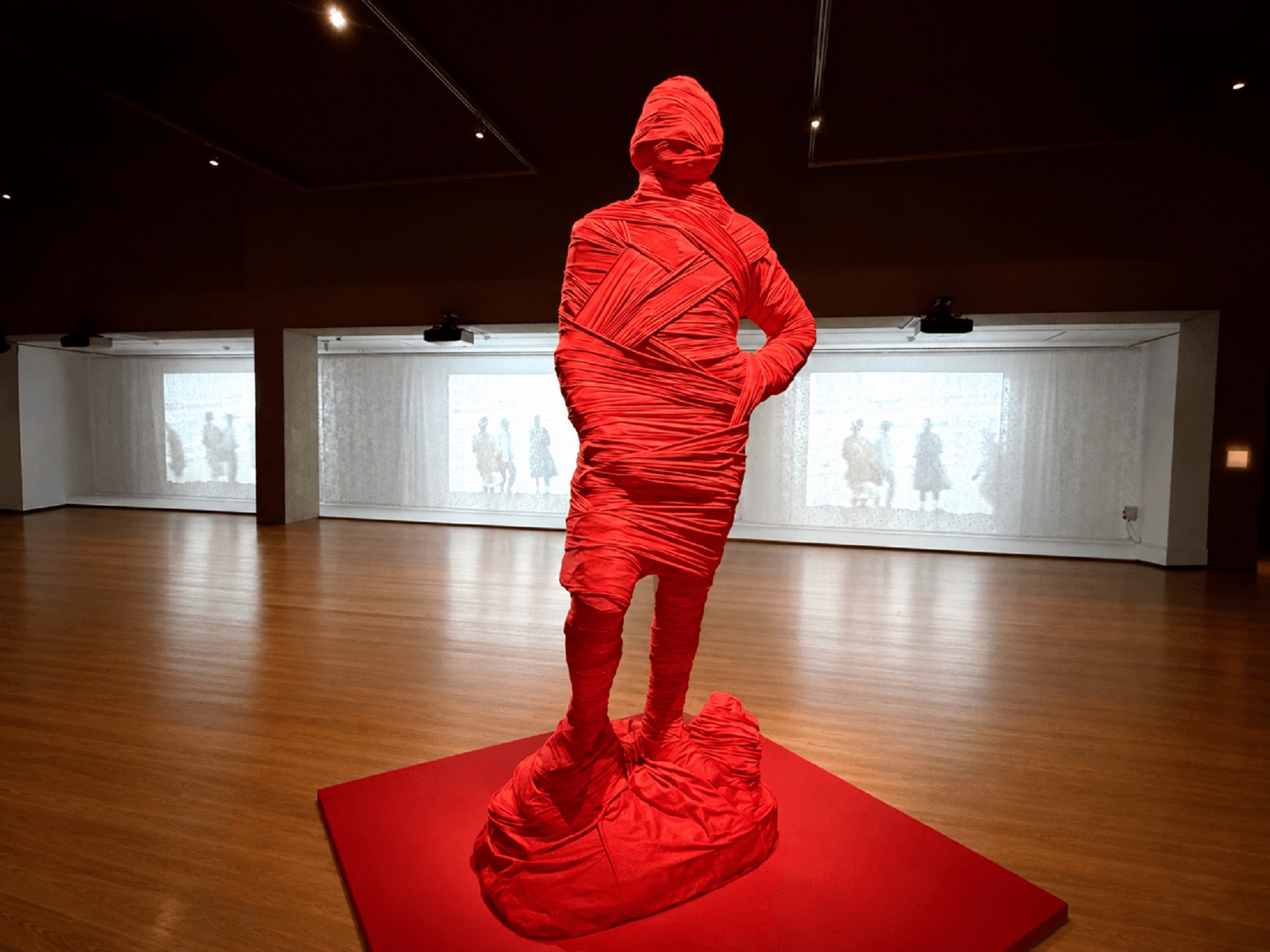 Mildred Howard: Poetics of Memory, installation view, featuring Peter Burnett: Untold Histories / Hidden Truths, 2025/2026, and Moving Stills, 2026. OMCA, Oakland.